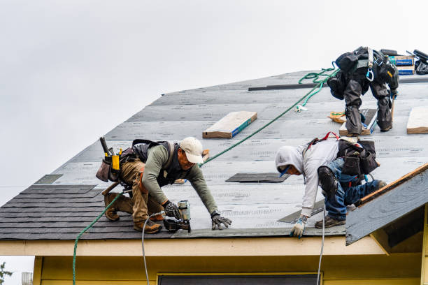 Professional Gutter Installation technician working in Slickville, PA